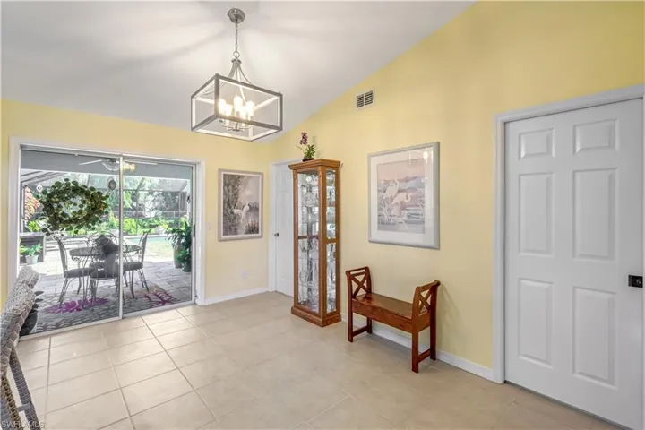 Dining area with decorative lighting.