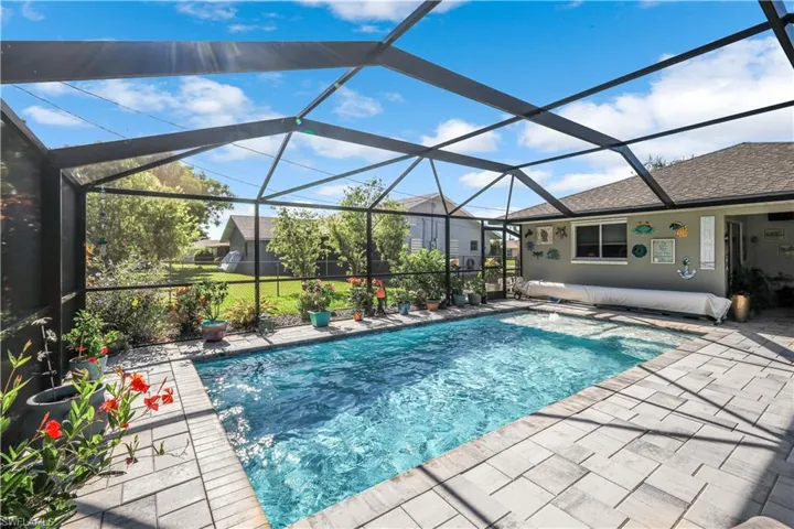 Pool surrounded with decorative pavers.