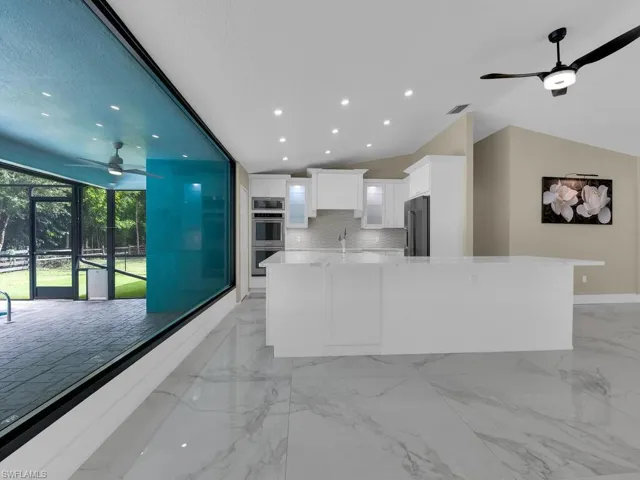 Huge Aquarium Window Overlooking Kitchen