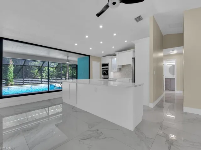 Kitchen w/ Long Breakfast Bar