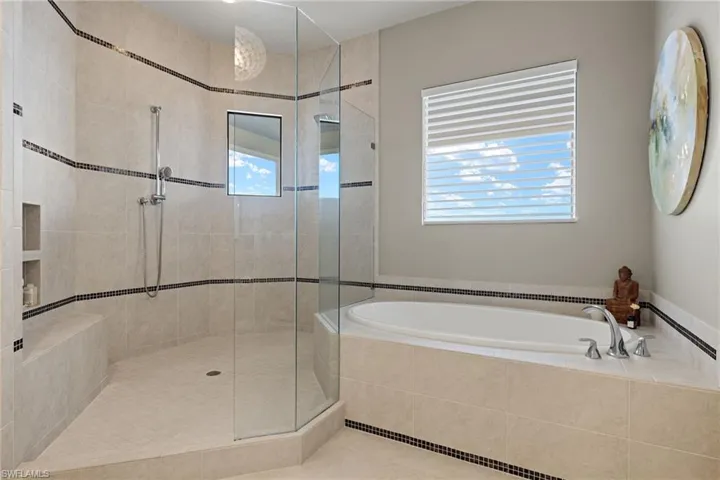 Bathroom with shower with separate bathtub