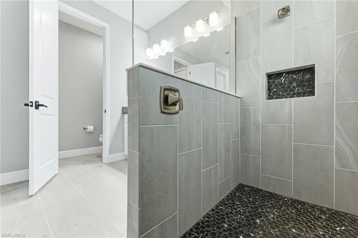 Designer touches in main bathroom shower
