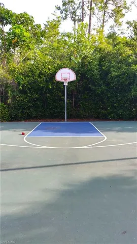 View of sport court featuring community basketball court