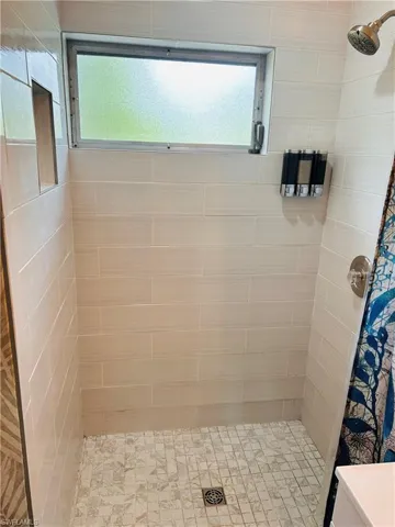 Bathroom with a stall shower