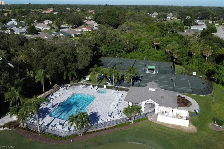 Bird's eye view of a main pool and tennis courts