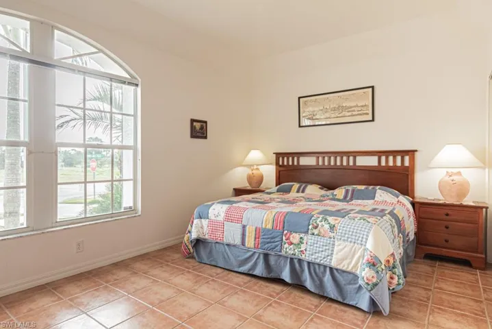Bedroom featuring light tile patterned flooring