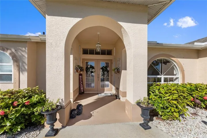 Property entrance with french doors