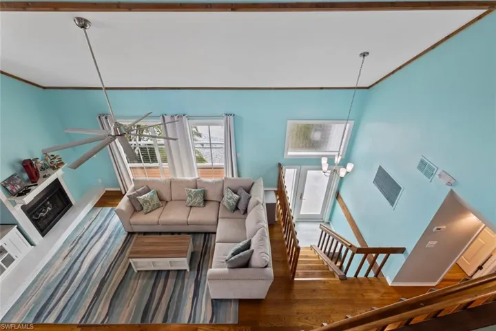 Main living area with soaring ceilings.