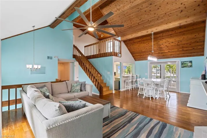 Main living area with soaring ceilings.