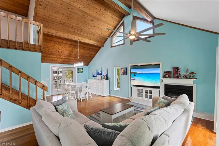 Main living area with soaring ceilings.