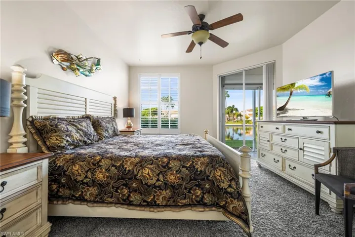 Wake up to views of the lake in your primary bedroom.