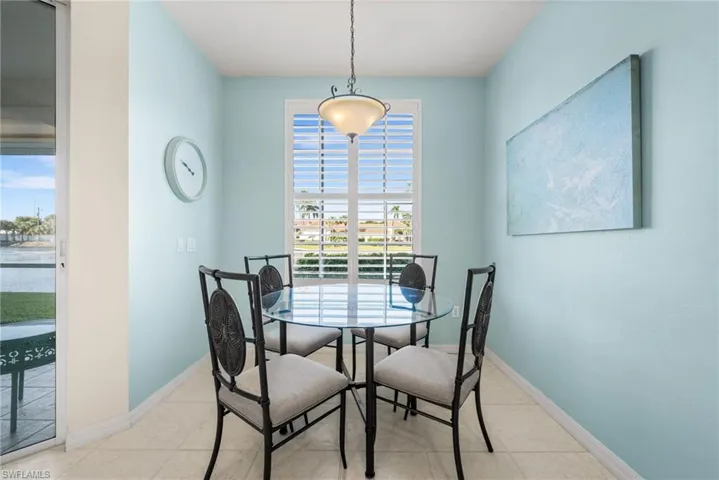 Views of the lake and plenty of natural light spills into the condo. Plantation shutters.