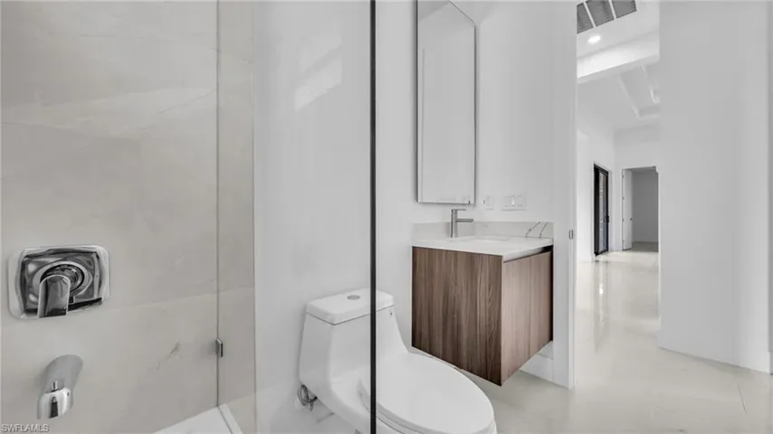 Full bathroom featuring vanity and a walk in shower