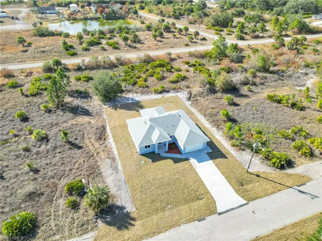 View of subject property featuring a nearby body of water