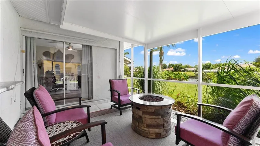 Sunroom featuring ceiling fan