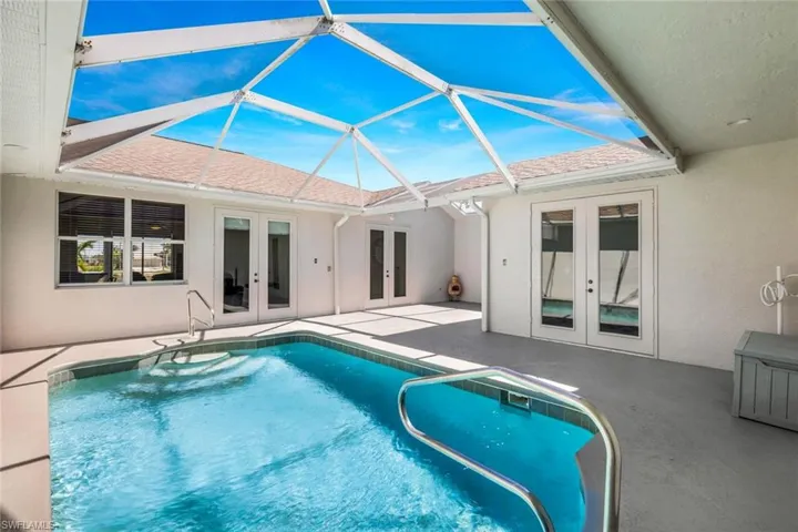 Screened in Courtyard with pool for relaxing.