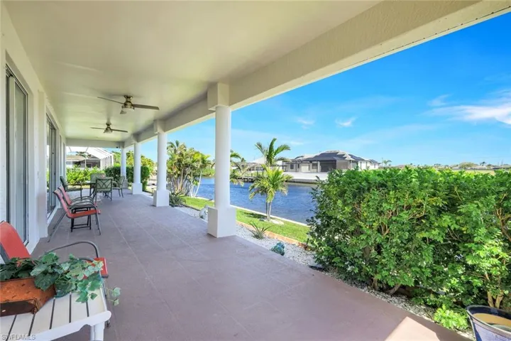 Large Open Lanai overlooking a wide canal. Great for relaxing or entertaining!