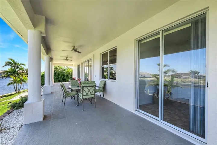 Ample space for outdoor entertaining along the water.