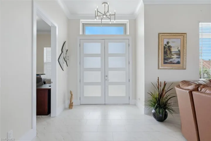 Double entry doors with frosted glass panels