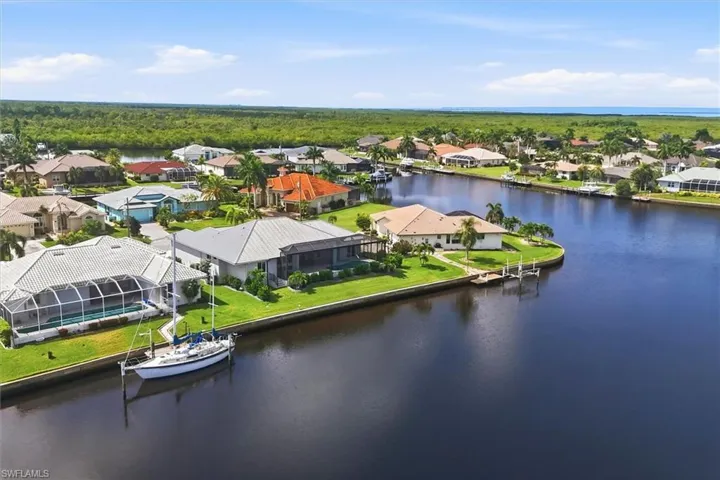 Canal-front homes with private boat docks and screened pools