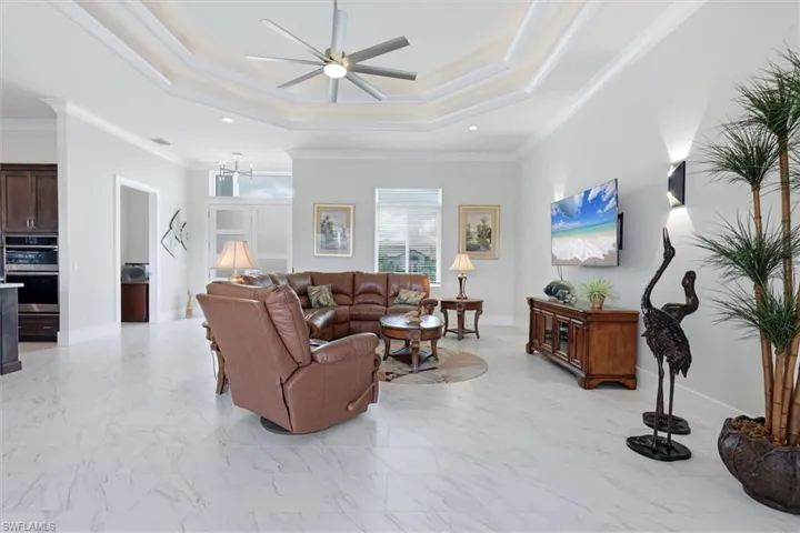 Tray ceiling with integrated lighting and a ceiling fan
