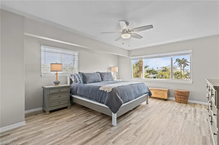 Bedroom featuring light wood finished floors and ceiling fan