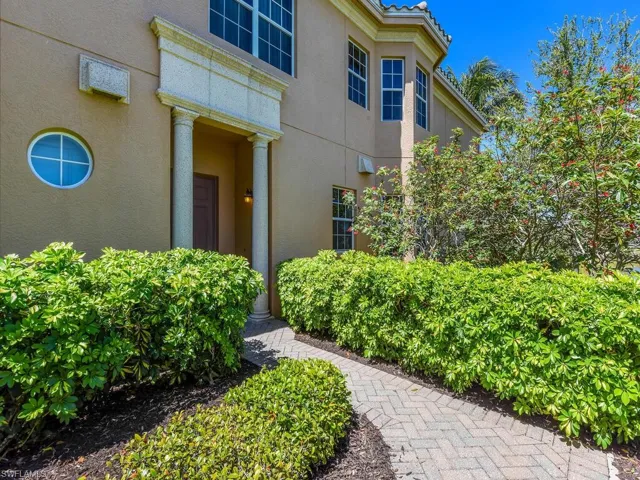 View of exterior entry with stucco siding