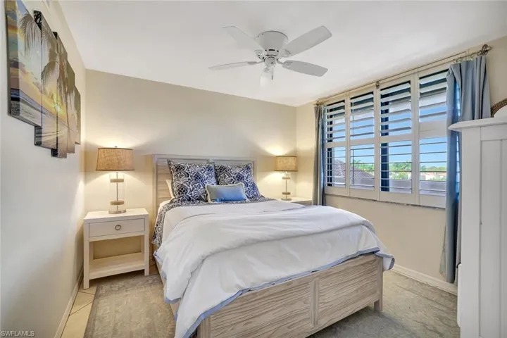 Bedroom featuring baseboards and a ceiling fan