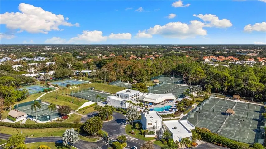 The World Tennis Center is a highly sought-after gated Naples community, renowned for its exceptional tennis and pickleball amenities, including 16 tennis courts and 4 pickleball courts.