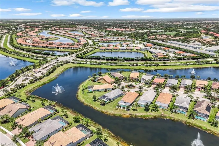 View of property location with nearby suburban area and a large body of water