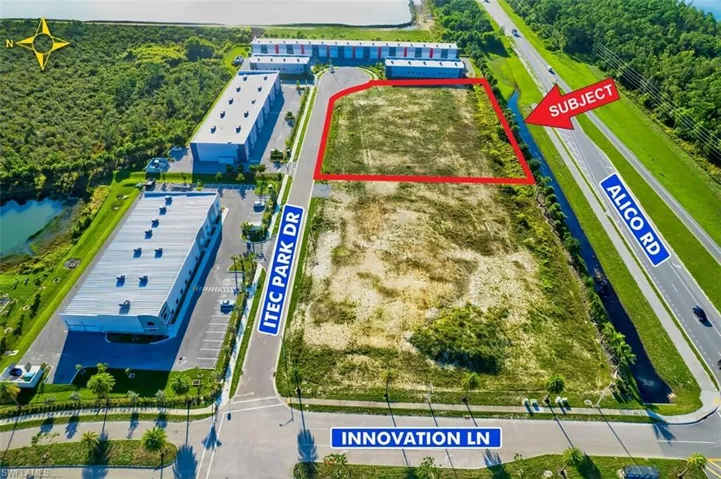 View of property location featuring property boundaries highlighted and a nearby body of water