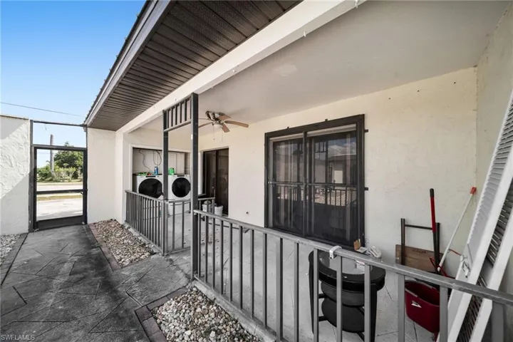 View of patio featuring ceiling fan