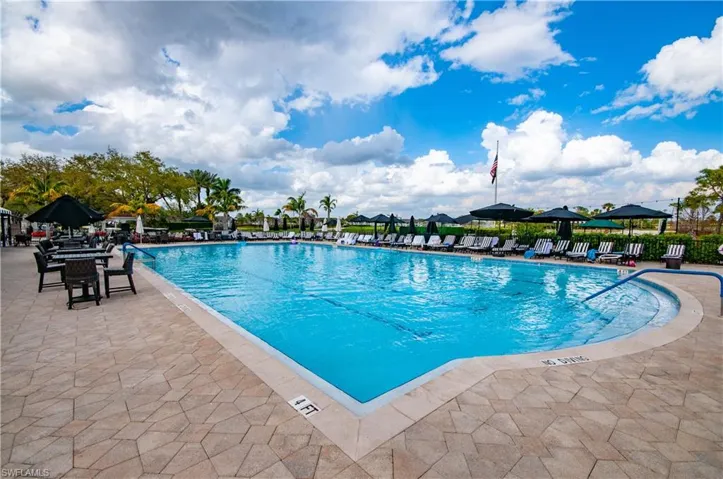 Community pool featuring a gazebo and a patio