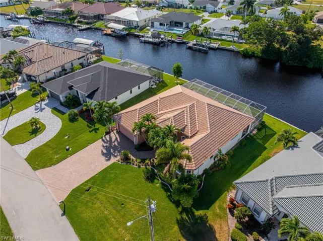 Aerial view of residential area with a nearby body of water