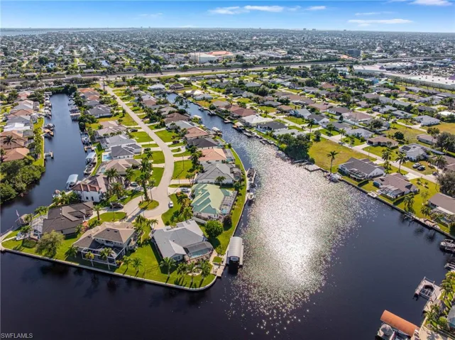 Aerial view of residential area with a large body of water
