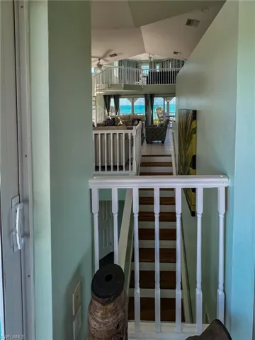Bar featuring stairway and visible vents