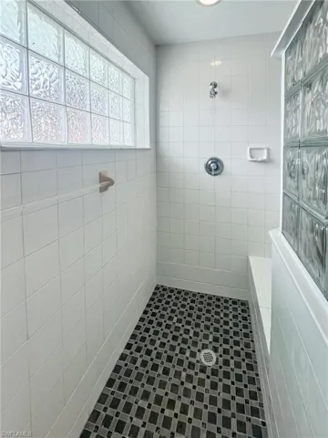Bathroom with a tile shower