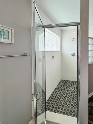 Bathroom with a stall shower