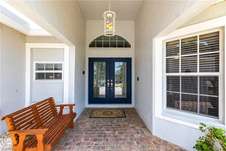 Property entrance with french doors