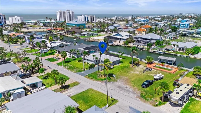 Birds eye view of property featuring a water view  - Virtually Edited Image.
