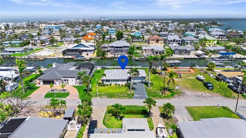 Drone / aerial view with a residential view and a water view  - Virtually Edited Image.