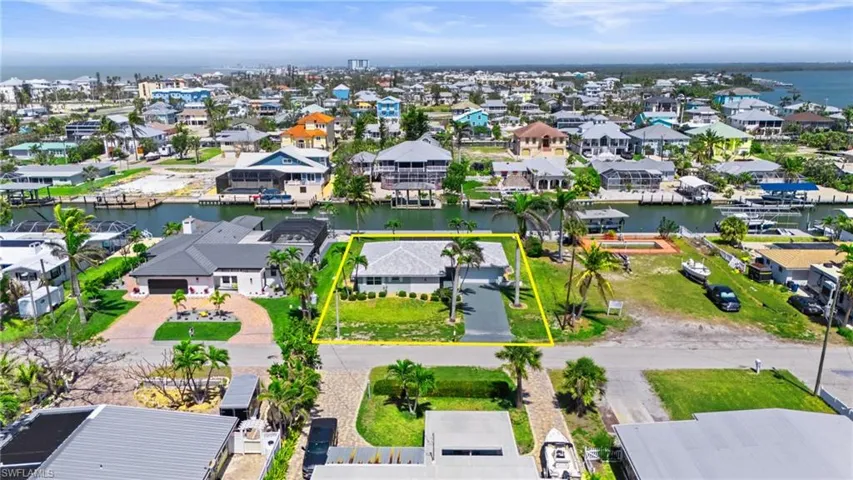 Birds eye view of property featuring a residential view and a water view  - Virtually Edited Image.