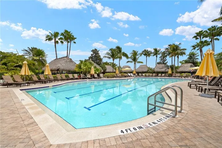 Community pool featuring a patio