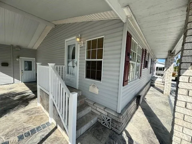 Front entrance under carport