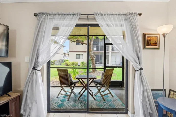 Dining room featuring light tile patterned flooring
