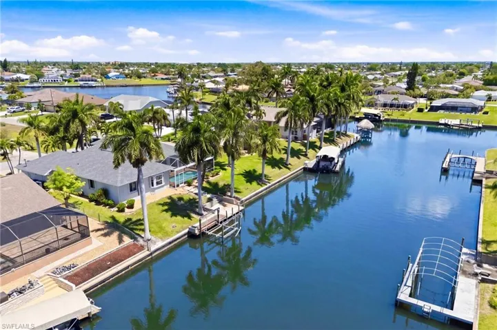 This property features a waterfront location with boat dock access and a boat lift