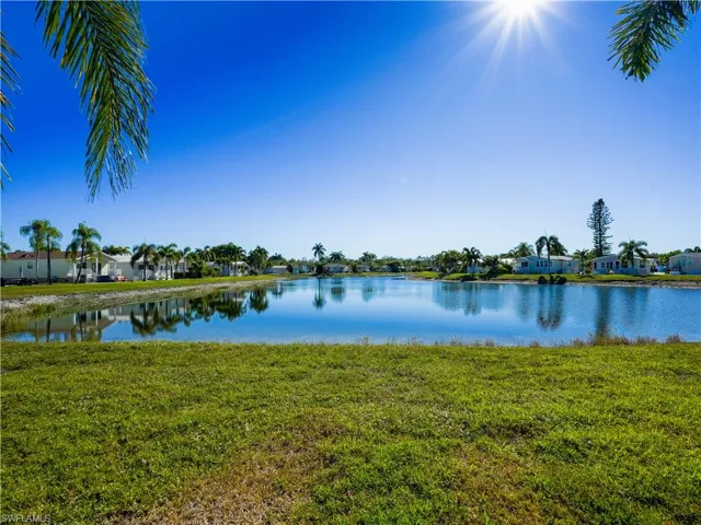 Water view featuring nearby suburban area