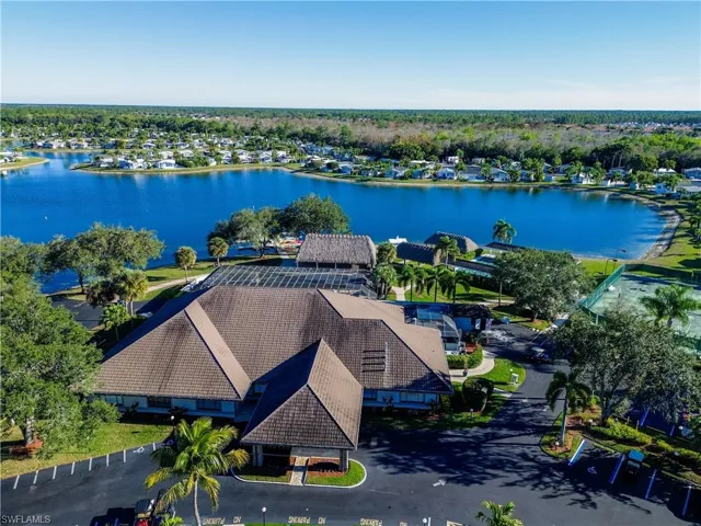 Aerial view of residential area with a large body of water
