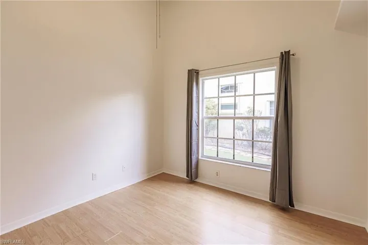Spare room featuring light hardwood / wood-style flooring