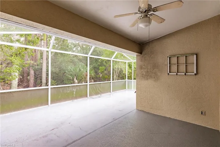 Oversized screened lanai with ceiling fan